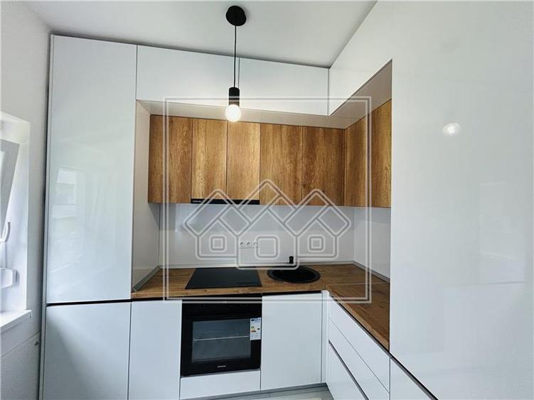 Ap nou, 52 mp utili, balcon - loc de parcare - Zona C. Arhitectilor - - 10