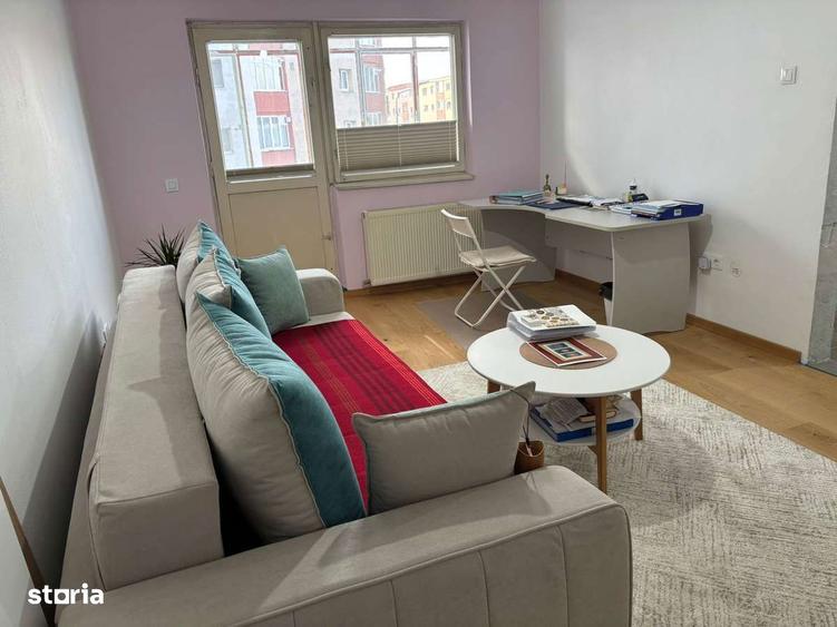 Apartament cu 2 camere decomandat în Tractorul
