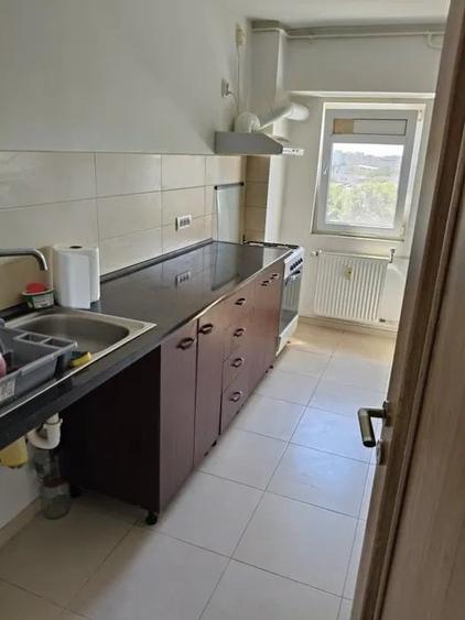 Garsonieră decomandată în Titan