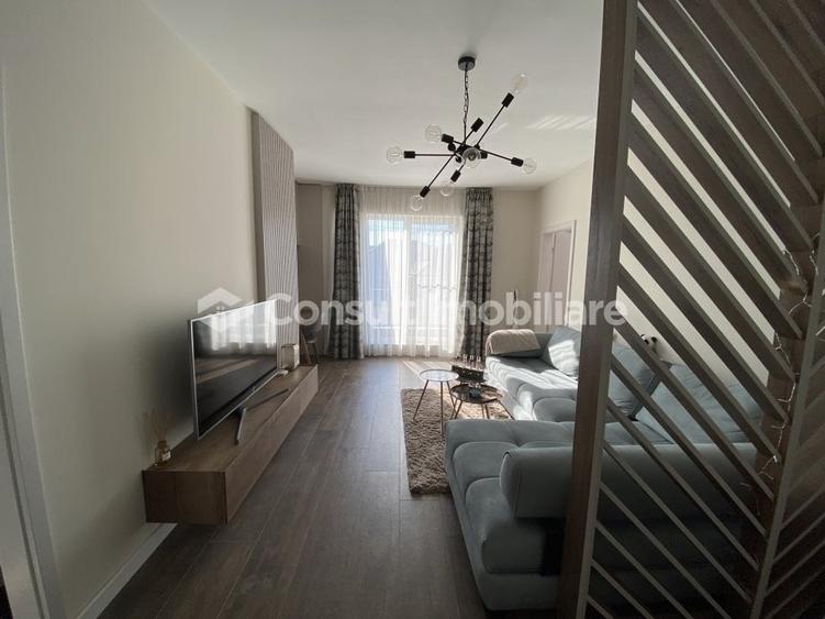 Apartament cu 2 camere semidecomandat, mobilat în Chinteni