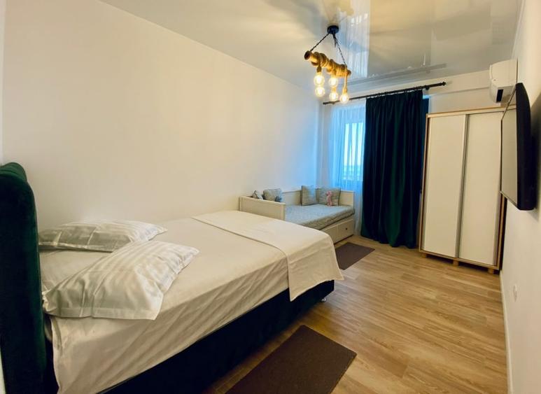 Apartament cu 2 camere semidecomandat, mobilat în Central
