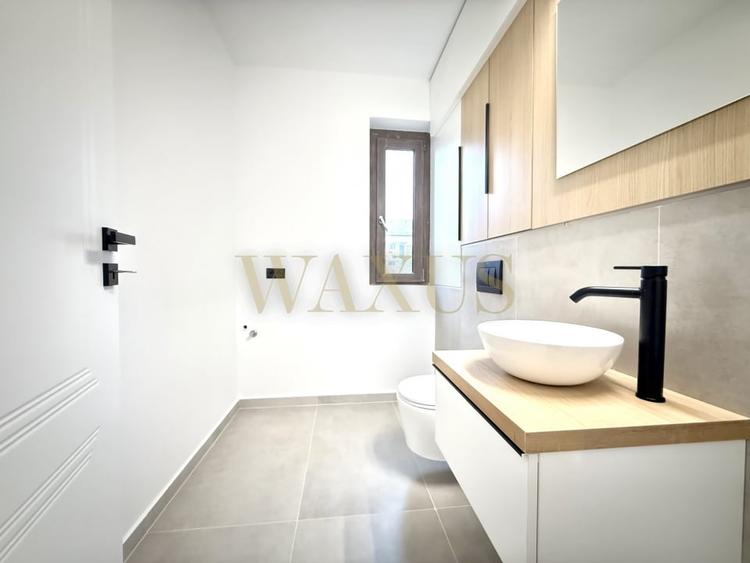 Apartament cu 3 camere semidecomandat, mobilat în Borhanci