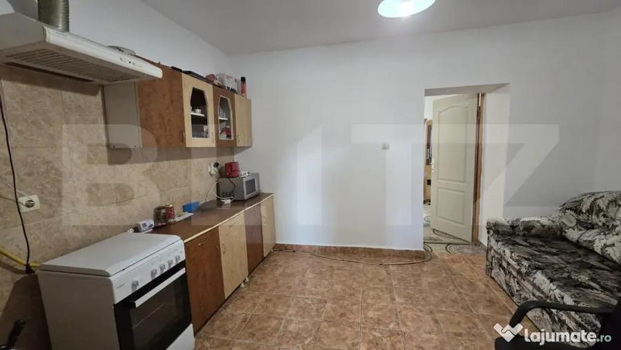 Casă cu 2 camere cu Teren 1000 Mp în Central