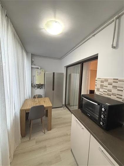Apartament cu 2 camere semidecomandat, mobilat în Iancului