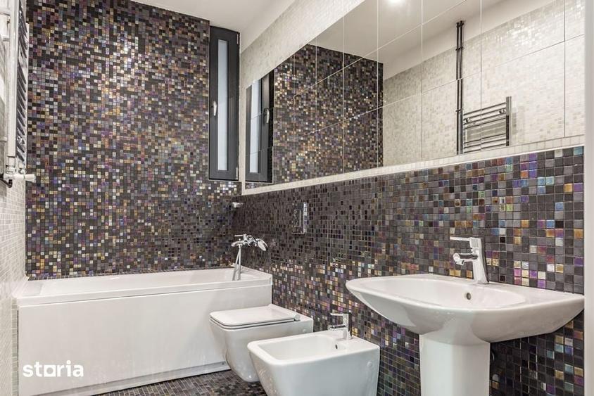 Apartament cu 4 camere în Romană