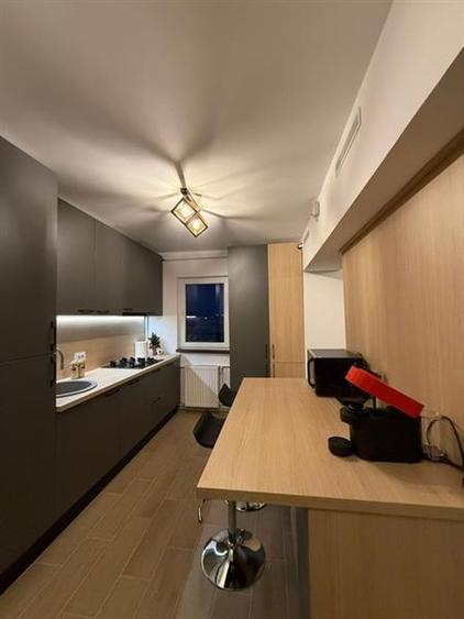 Apartament cu 2 camere decomandat, mobilat în Tractorul — fotografia 3