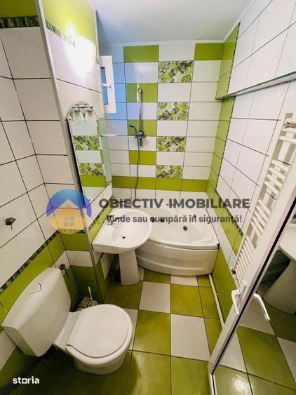 Apartament cu 2 camere semidecomandat, mobilat în Central