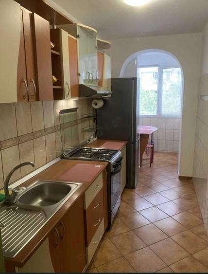 Apartament cu 2 camere decomandat în Podu Roș