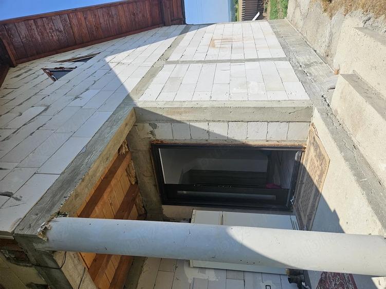 Casă cu Teren 1000 Mp în Central