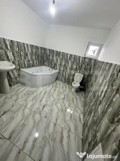 Casă cu 4 camere cu Teren 570 Mp în Tomești