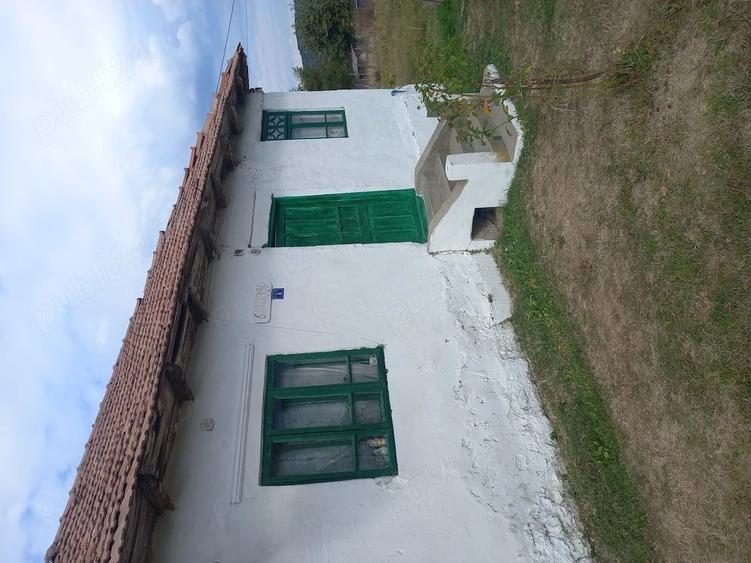 Casă cu 4 camere cu Teren 1000 Mp în Copăceni