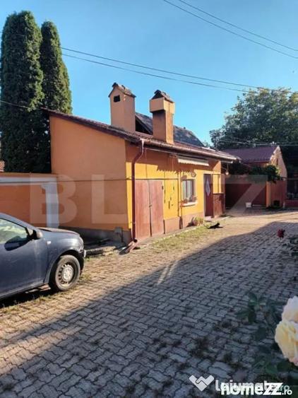 Casă cu 4 camere cu Teren 1210 Mp în Stupini