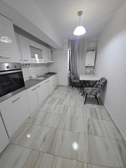 inchiriez apartament cu 2 camere in Complex Bucium Confort - 1