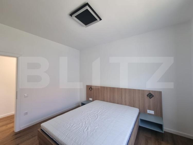 Apartament cu 2 camere semidecomandat, mobilat în Baciu