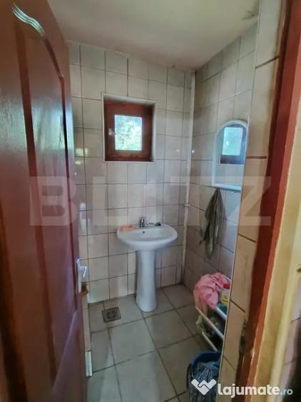 Casă cu 3 camere cu Teren 2240 Mp în Raciu