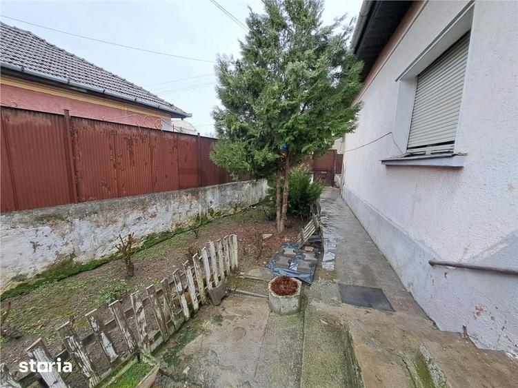 Casă cu 2 camere decomandat cu Teren 257 Mp în Sânmartin
