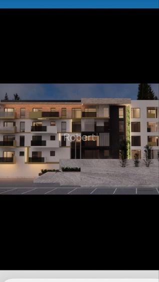 Vand apartament cu 2 camere in Tudor,bloc nou,cu gradina privata,balcon,parcare si boxa