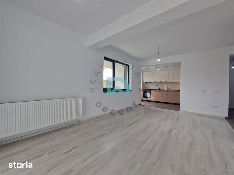 Apartament cu 3 camere decomandat în Tractorul
