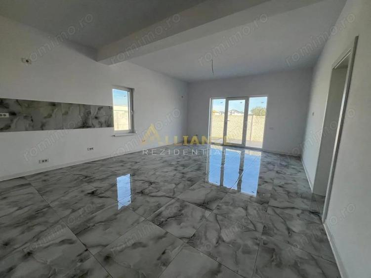 Casa individuala - 82 mp utili + terasa 13 mp - Teren- 380 mp - 12