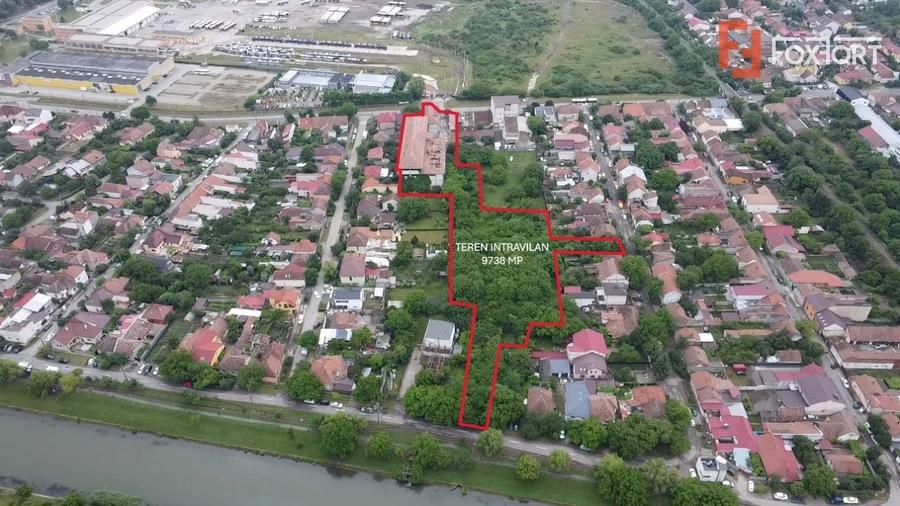 Teren intravilan 9738 mp, cu iesire pe 3 strazi - zona Dambovita - 2