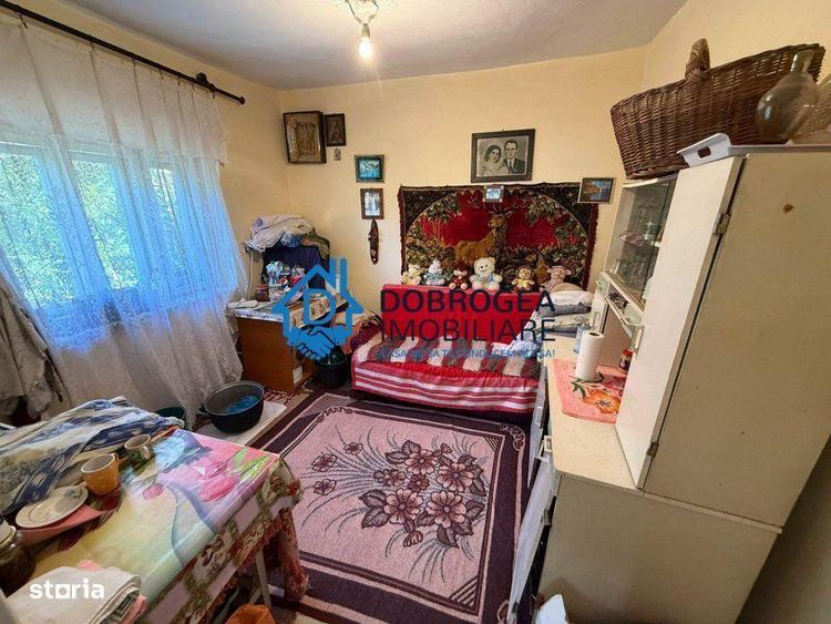 Caslita - teren 513 mp, pomi fructiferi, casa 2 camere - 6