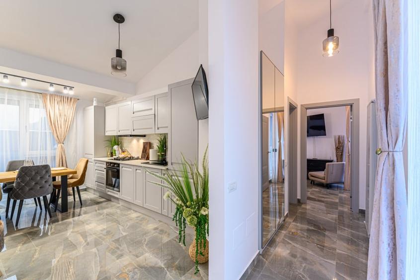 Apartament unic in PREDEAL – LUX, vedere la partie cu terasa si parcare - 3