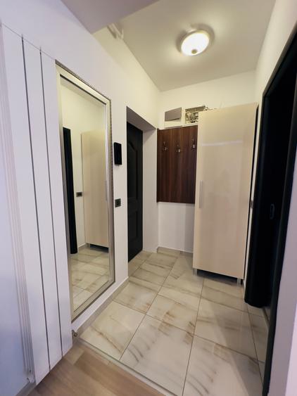 Apartament cu 3 camere si 2 grupuri sanitare in zona Tractorul la Isaran,et7/10 - 14