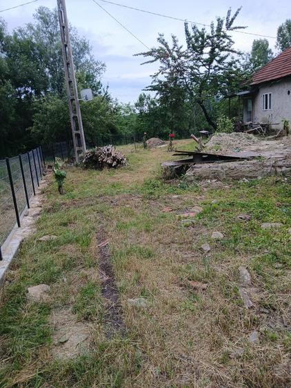 Casă cu Teren 1200 Mp în Bozioru