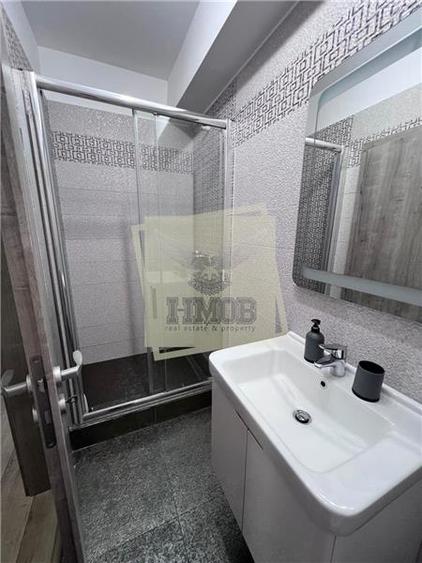 Apartament cu 2 camere semidecomandat, mobilat în Central