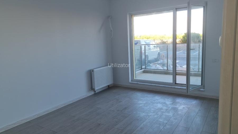 Apartament nemobilat, situat la parter + 2 locuri de parcare