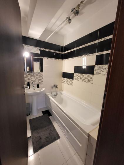 Se ofera in chirie apartament 2 camere - 4