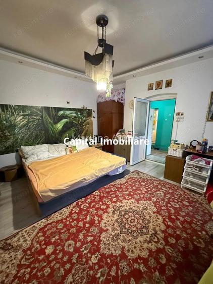 Casa cu doua corpuri + teren 374 mp, gradina, terasa ?i magazie