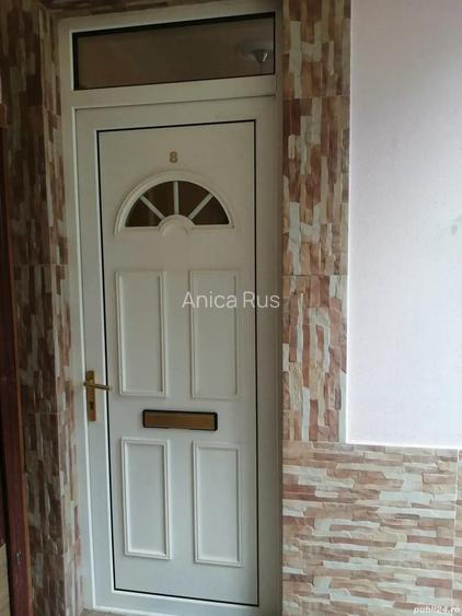 Apartament spa?ios la casa cu o camera la curte comuna, zona garii.
