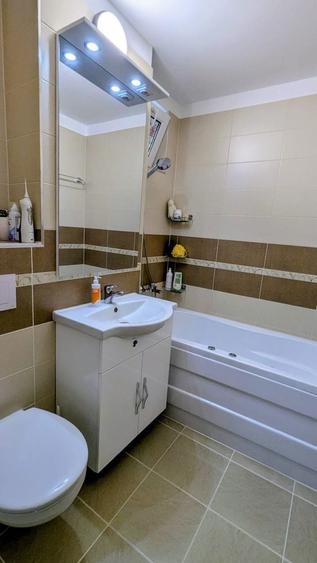 Apartament cu trei camere -decomandat - 16