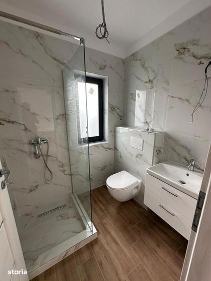 Casa pe parter cu incalzire in pardoseala si tripan - 9