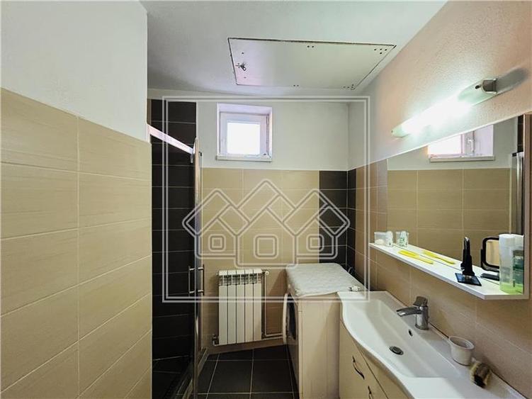 Casa de vanzare in Sibiu - 100 mp utili + teren de 198 mp - - 28