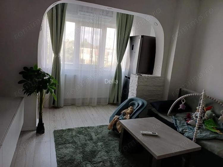 Zona Gheroghe Lazar de vanzare apartament cochet cu 2 camere Zona Gheroghe Lazar de vanzare apartament cochet cu 2 camere