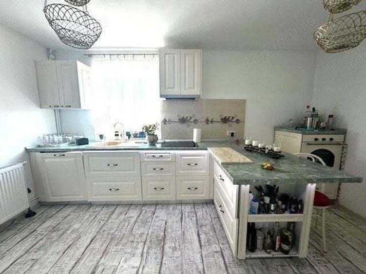 Casa S+P+1E+M pe un teren de 1430 mp in Coteana - 2