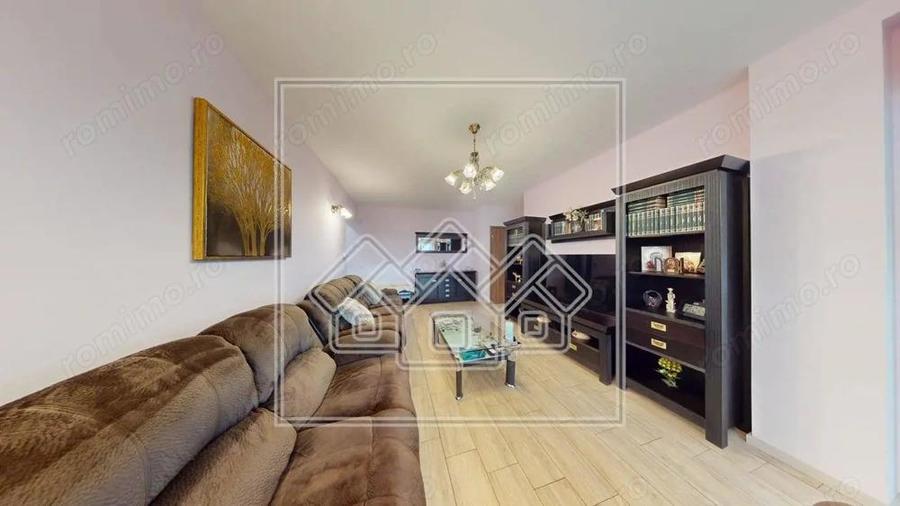 Ap.cu 3 camere, 2 bai si balcon, etaj intermediar, mobilat si utilat - 18