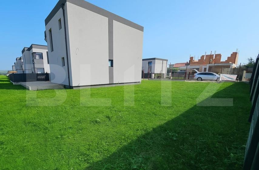 Casa moderna, situata in Jucu de Mijloc , pe un teren de 400 mp. - 2
