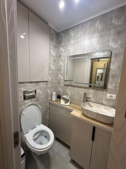 Apartament cu 3 camere decomandat în Sud