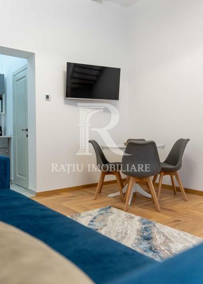 Apartament cu 2 camere semidecomandat, mobilat în Central