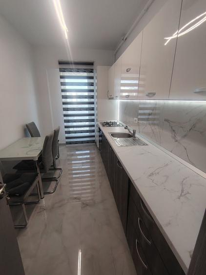 Apartament cu 2 camere decomandat în Cățelu