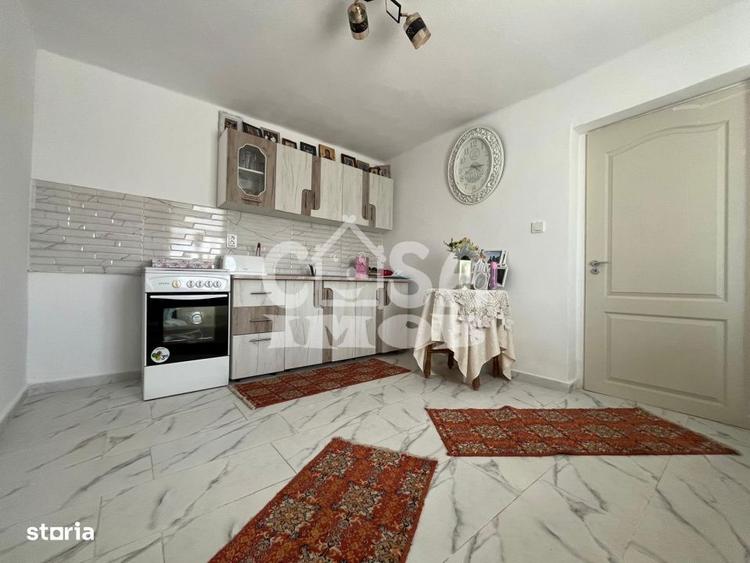 Casa parter + anexa renovata cu teren la strada - 13
