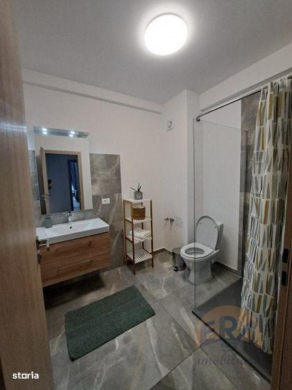 Apartament cu 2 camere decomandat în Rontău
