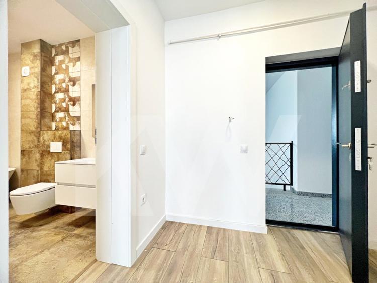 Apartamet finisat la cheie cu 3 camere, bucatarie mobilata si doua bai. - 12