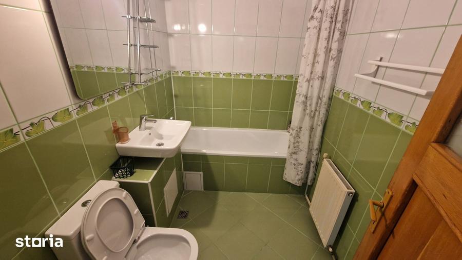 Apartament cu 3 camere decomandat în Tractorul