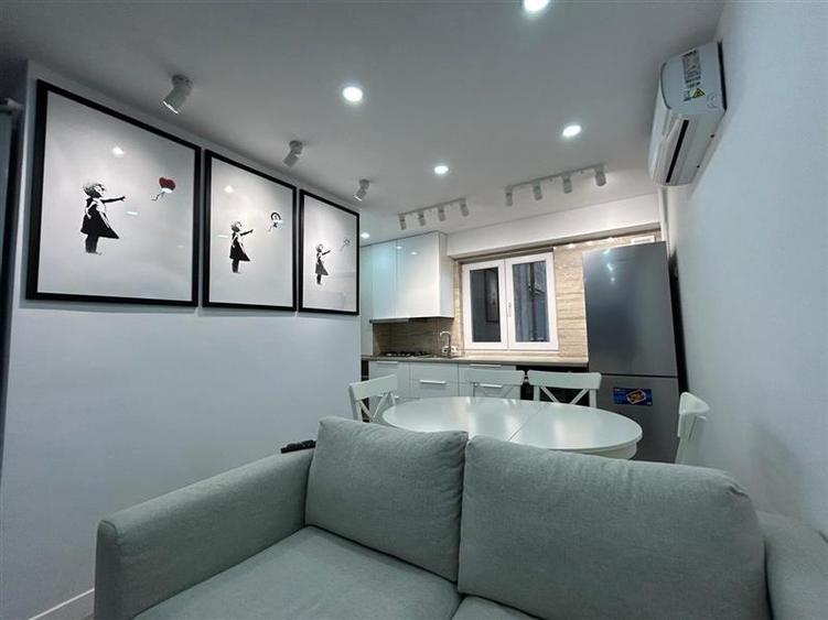 Apartament cu 3 camere semidecomandat, mobilat în Unirii — fotografia 3