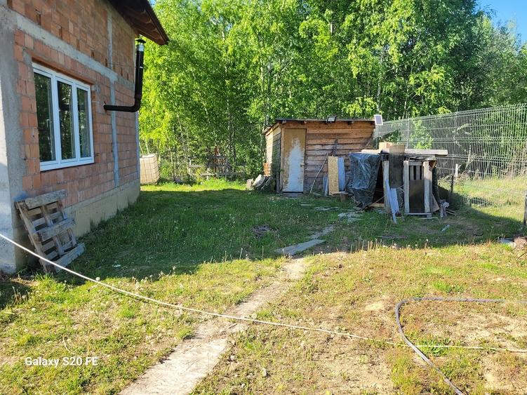 Casă cu Teren 1000 Mp în Central