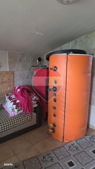 Casa cu teren generos de 2.800 mp la 38 km in satul Elciu - 11